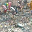 Scavengers rummaging through the relics of a supermarket gutted during the Iju Ishaga gas explosion on Tuesday [NAN]