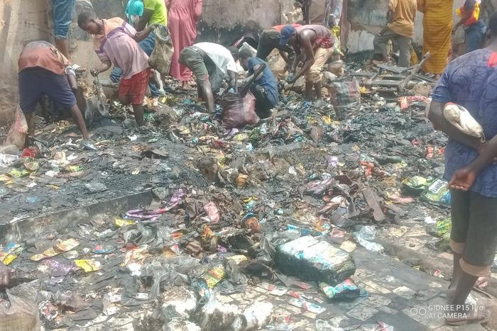 Scavengers rummaging through the relics of a supermarket gutted during the Iju Ishaga gas explosion on Tuesday [NAN]