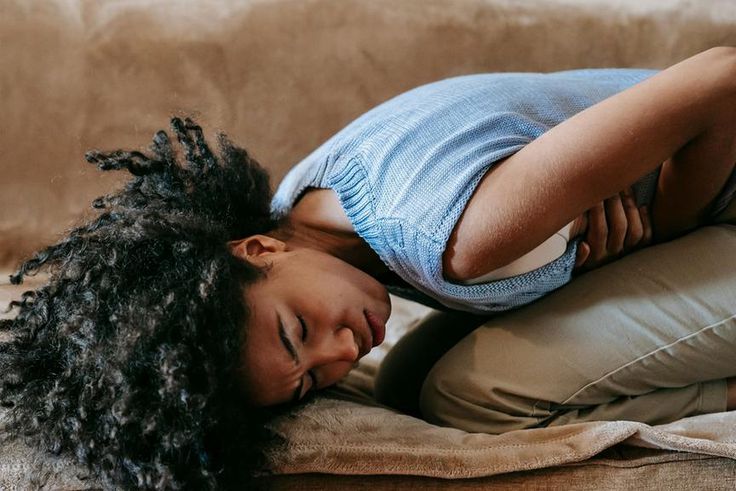 Woman suffering from abdominal pain [Image Credit: Sora Shimazaki]