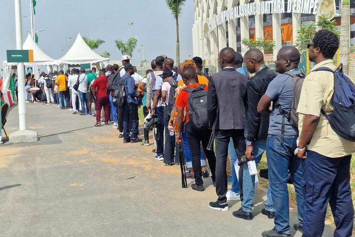 Supporters, media men under security screening before access to the Olympique Alassane Ouattara Stadium, D’Ebimpe, venue of the 2023 AFCON final between Nigeria and Cote d’Ivoire [NAN]