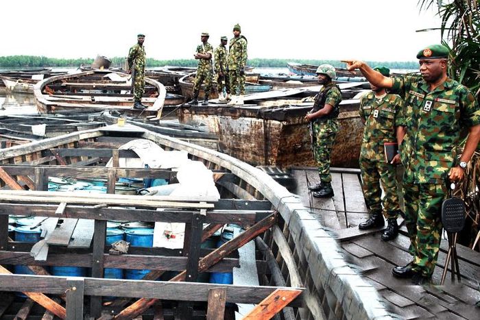 Nigerian Army officers army arrest 21 suspected oil thieves in Abia.
