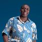 A man in a flowery pattern shirt