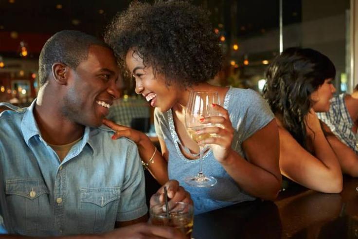 Black couple on a date [The Standard]
