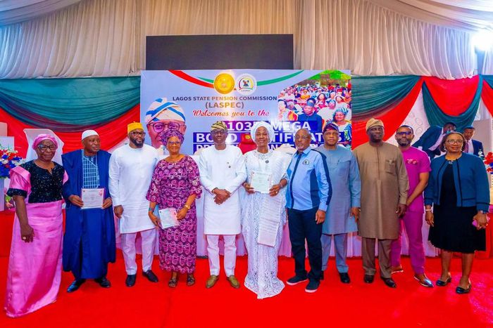 Lagos State officials led by Gov. Babajide Sanwo-Olu and some retirees during the 103rd Retirement Bond Certificates Presentation on Friday in Lagos [NAN]