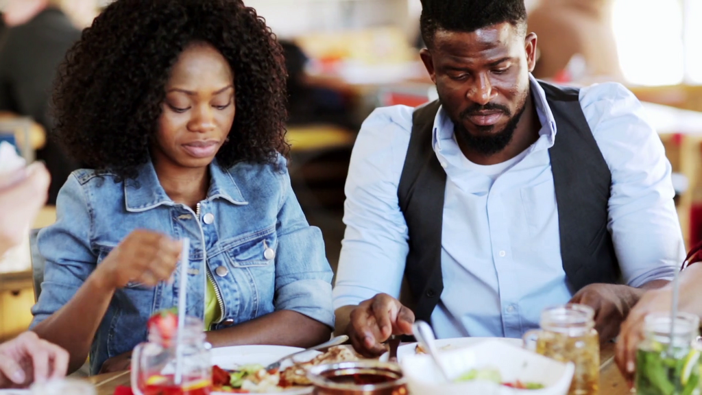 A lunch date between a man and a woman [Source: Video Blocks]