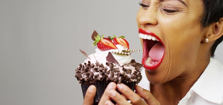 ___8307126___2018___4___26___13___black-woman-eating-cake