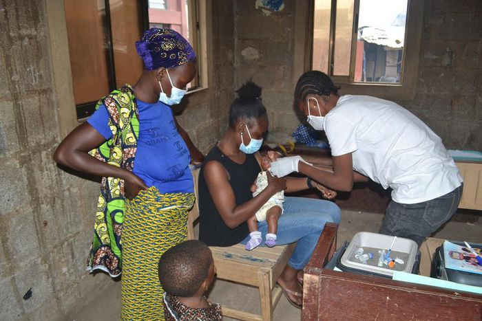 A child receiving immunisation (Alabiamo Foundation)