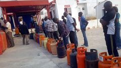 A cooking gas depot with customers in queue to refill their cylinders. [Punch]