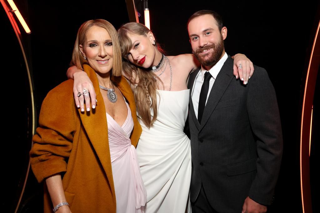 Cline Dion, Taylor Swift, and Ren-Charles Anglil at the 66th Grammy Awards.Kevin Mazur/Getty Images for The Recording Academy