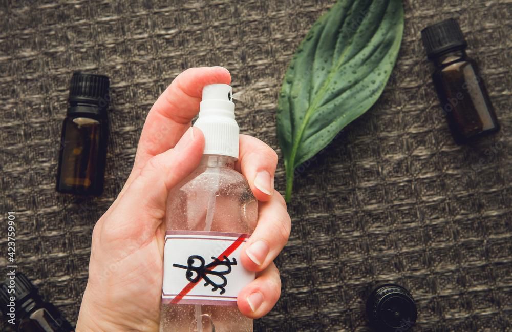 Herbal repellent in a spray bottle [AdobeStock]