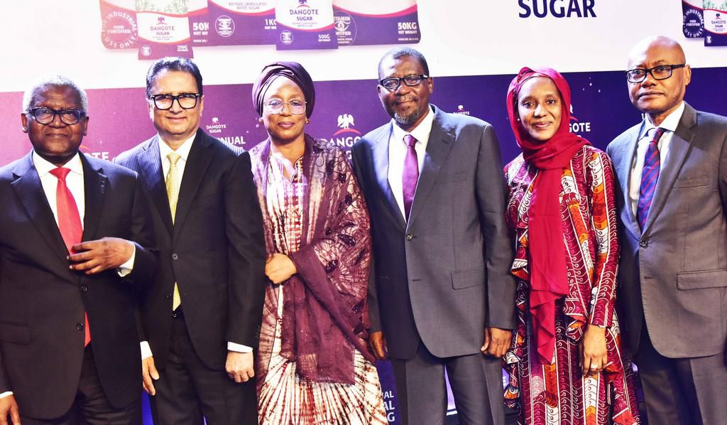L-R: Chairman, Dangote Sugar Refinery Plc, Aliko Dangote;  Group Managing Director/CEO, Dangote Sugar Refinery Plc, Ravindra Singhvi; Non-Executive Director, Dangote Sugar Refinery Plc, Maryam Bashir; Non-Executive Director, Dangote Sugar Refinery Plc,...