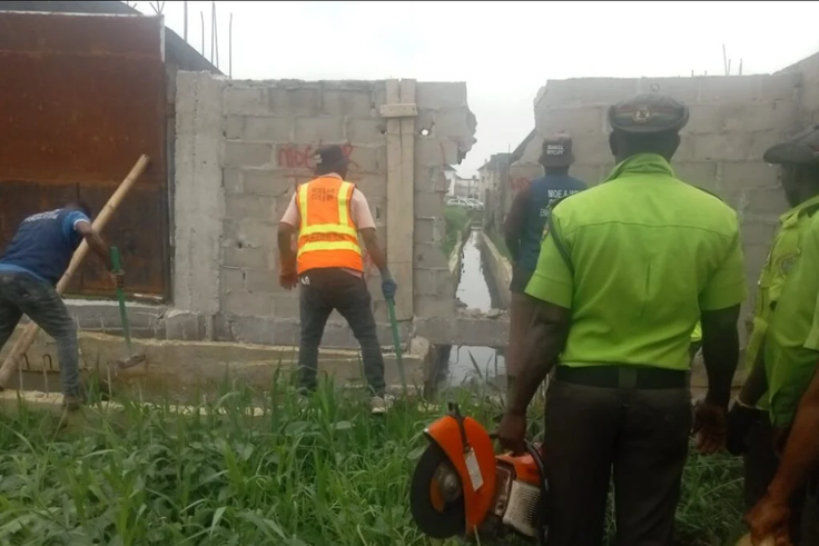 Flood: LASG demolishes street gates, fences, security post in Okota