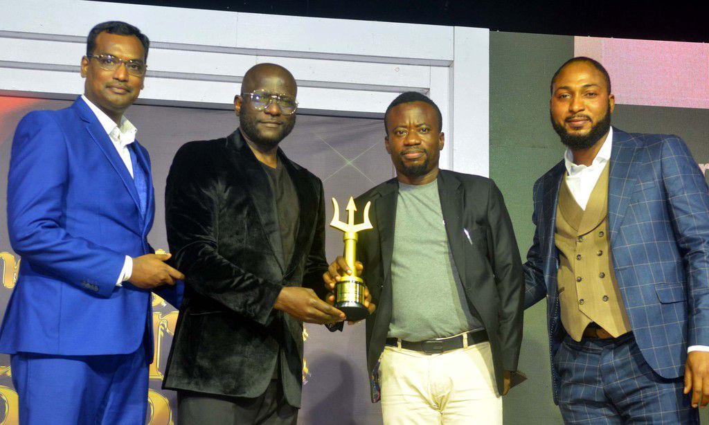 L-R: Head, Corporate Marketing LG Electronics, Hari Elluru, Managing Director, Ojbrands Optimal, Otis Ojeikhoa, presenting Refrigerator Brand of the Decade Award to Marketing Manager, LG Electronics, Paul Mba, with them is Public Relations Manager, LG ...