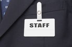 Staff wearing tags