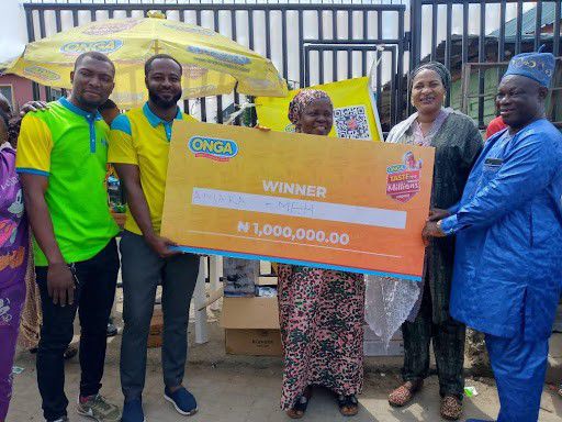 Amaka Ameh, a lucky winner from the Onga Taste the Millions week 1 raffle draw during the presentation of the N1M prize at the redemption center in Lagos recently.