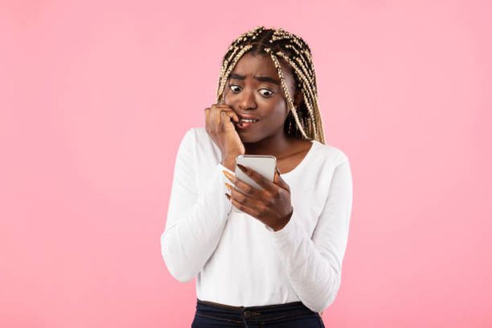 Scared black woman (iStock)