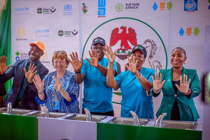 L – R: Representative of the World Health Organization (WHO), Dr. Edwin Isotu Edeh; Chief WASH Nigeria at UNICEF, Dr. Jane Bevan; Permanent Secretary of the Federal Ministry of Water Resources and Sanitation, Mr Richard Pheelangwah representing the Min...