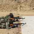 A US Army Special Forces soldier observes a Nigerian soldiers during training in Diffa, Niger, February 28, 2017.