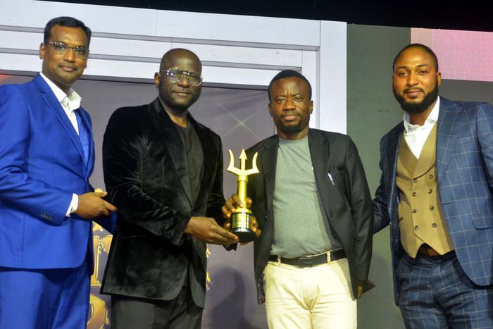 L-R: Head, Corporate Marketing LG Electronics, Hari Elluru, Managing Director, Ojbrands Optimal, Otis Ojeikhoa, presenting Refrigerator Brand of the Decade Award to Marketing Manager, LG Electronics, Paul Mba, with them is Public Relations Manager, LG ...