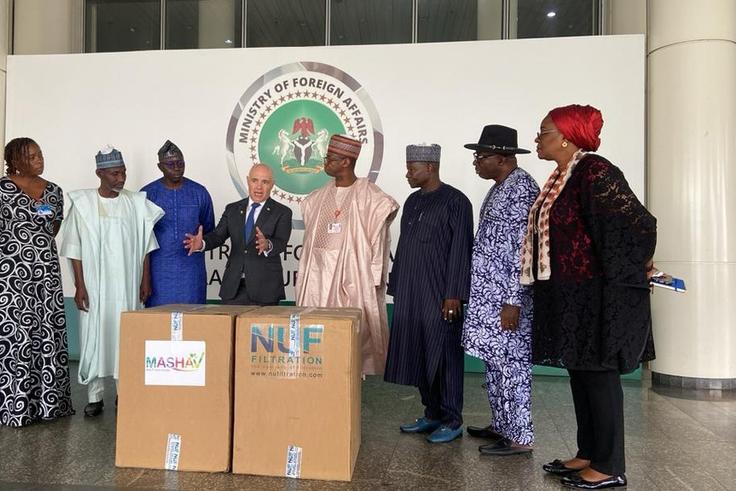 Amb. Michael Freeman donating water machines at the Ministry of Foreign Affairs on Friday in Abuja [NAN]