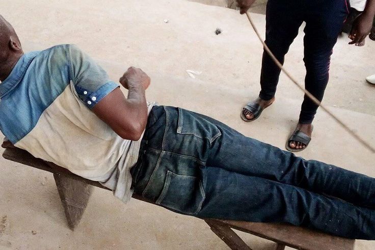 Man-Gets-Strokes-Of-Cane