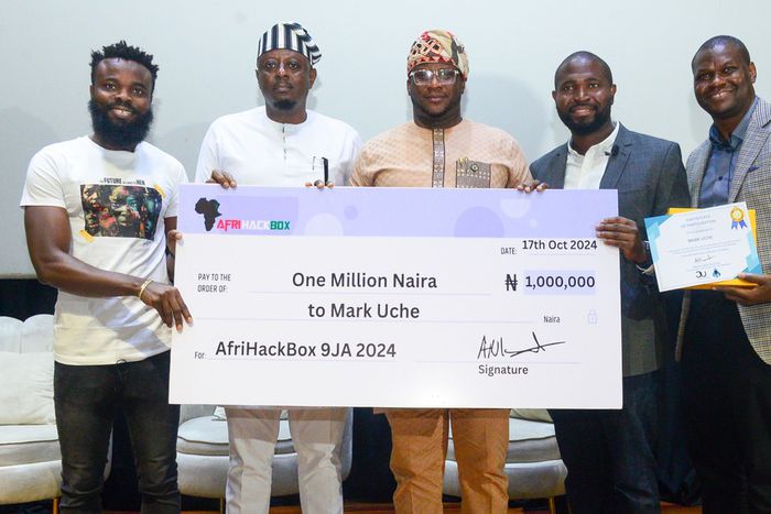 L-R: Suwebatu AB CEO, Paul John; Representative of SGF of the Federation, Arnold Agure-Dam; Commissioner for Wealth Creation and Employment, Lagos State, Hon. Akinyemi Bankole Ajigbotafe;  CO-Founder and CEO Just Unsecure and AfriHackBox, Babatunde Ani...