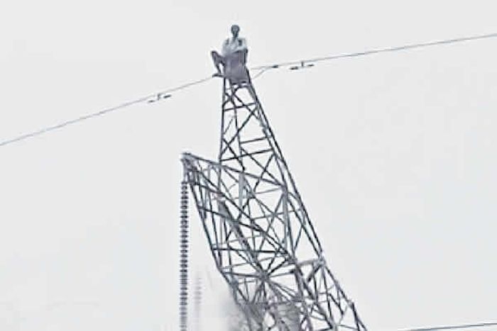 Man who climbed pole demanding Tinubu's resignation admitted to psych hospital