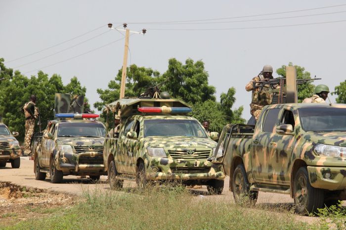 Nigerian soldiers patrol after a suspected gunmen attack. [Getty Images]
