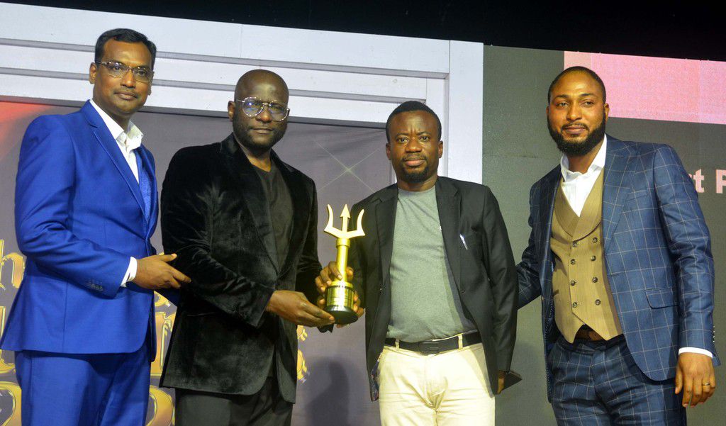 L-R: Head, Corporate Marketing LG Electronics, Hari Elluru, Managing Director, Ojbrands Optimal, Otis Ojeikhoa, presenting Refrigerator Brand of the Decade Award to Marketing Manager, LG Electronics, Paul Mba, with them is Public Relations Manager, LG ...