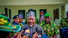 Minister of Defence, Alhaji Mohammed Badaru, inspecting guard of honour during operational visit.