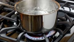 Man baths neighbour with hot water, police arrest suspect