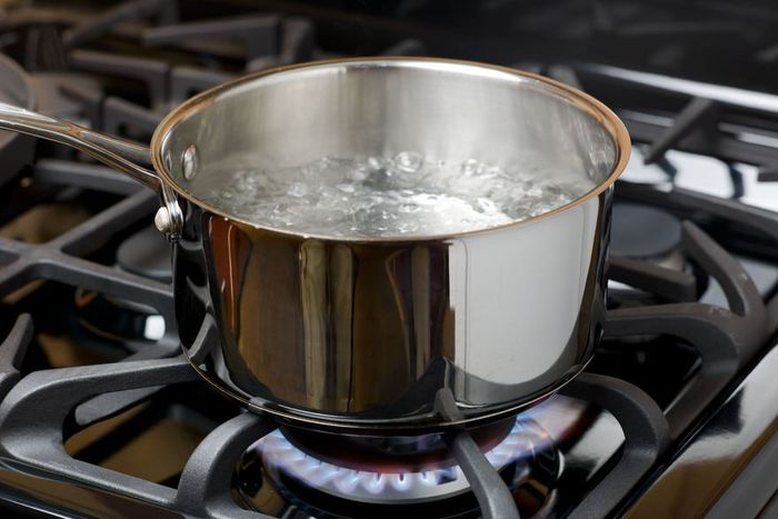 Man baths neighbour with hot water, police arrest suspect