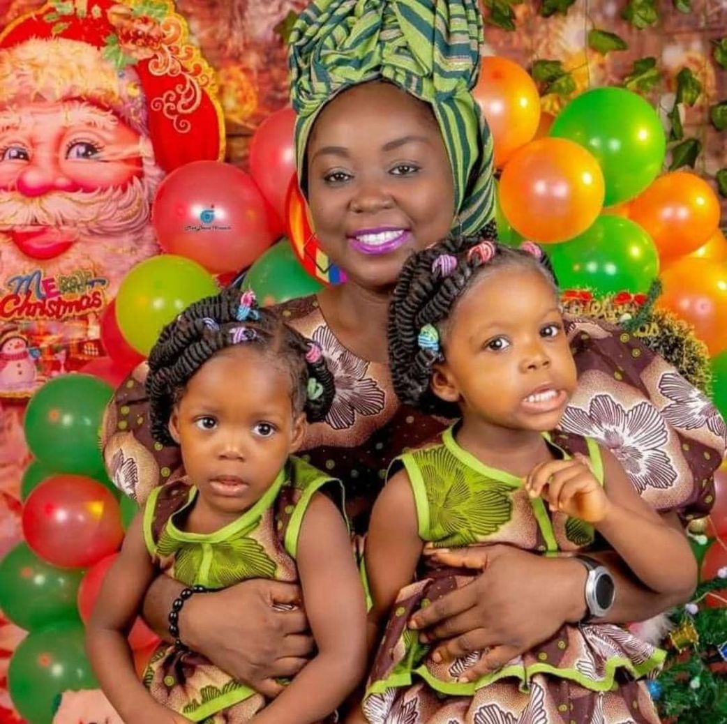 Judith Akinwunmi with her twin daughters