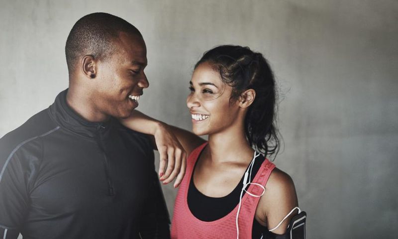 Man and woman smiling happily