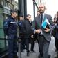 French Prime Minister Edouard Philippe (C) arrives to announce the suspension of fuel tax increases for six months after weeks of "yellow vest" popular protests