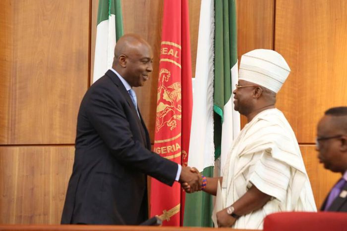 Senate President Bukola Saraki welcoming Senator Ademola Adeleke to the National Assembly on Wednesday, July 12, 2017