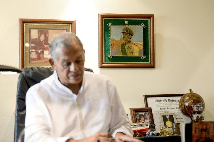 Mohammed Sadat proudly keeps a photo of his late uncle in his Cairo office