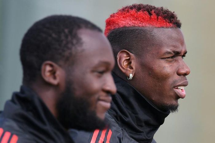 Romelu Lukaku (left) and Paul Pogba (right) were both dropped to the bench for Manchester United's clash with Arsenal on Wednesday