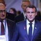 The violent street protests in Paris have raised questions abroad if President Emmanuel Macron (C) is still able to reform France - let alone the European Union