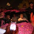 Former Pakistani prime minister Nawaz Sharif was driven away in an SUV as it was pelted with rose petals in celebration, with younger brother Shahbaz Sharif in the front seat of the vehicle