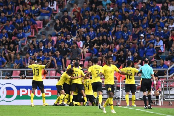 The away supporters were soon celebrating as Malaysia drew level before the half-hour