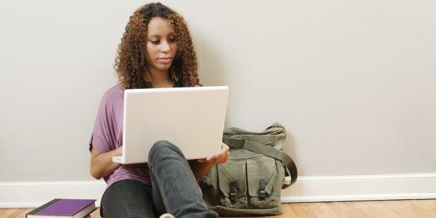 A female student on a computer.