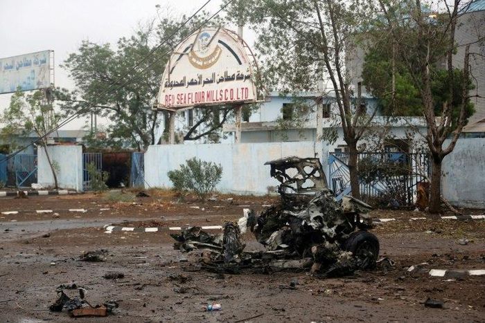 A picture taken on September 13, 2018 shows the carcass of a car reportedly destroyed in a Saudi-led coalition air strike on the eastern outkirts of Hodeida ahead of its resumed offensive on the rebel-held Yemeni port city