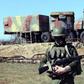 A Russian soldier stands guard in front of an S300 surface-to-air missile battery like those delivered to Syria after a September Israeli strike during which a Russian aircraft was accidentally downed