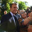 Emmanuel Macron with visitors attending the open house at the Elysee Palace on Saturday during France's Heritage Days
