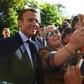 Emmanuel Macron with visitors attending the open house at the Elysee Palace on Saturday during France's Heritage Days