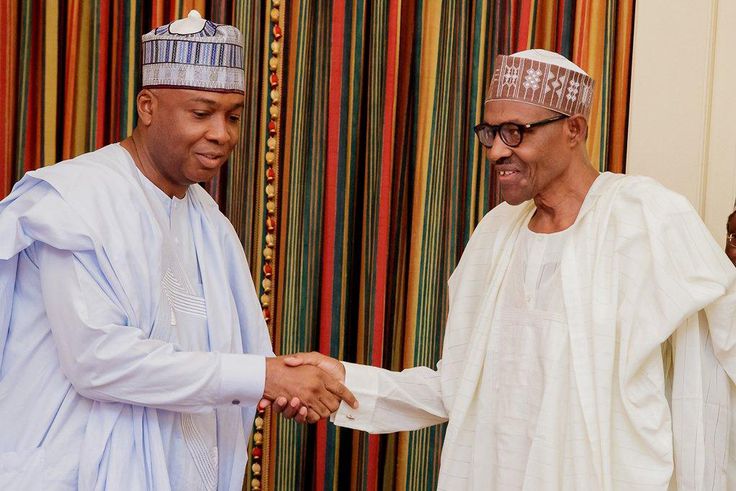 President Muhammadu Buhari (right) shakes hands with President of the Senate, Bukola Saraki (left)