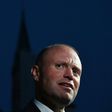Malta's Prime Minister Joseph Muscat speaks to the media as he arrives in Salzburg, Austria on September 19, 2018 prior to a dinner as part of the EU Informal Summit of Heads of State or Government