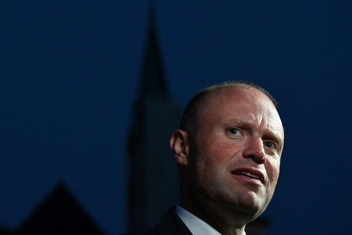 Malta's Prime Minister Joseph Muscat speaks to the media as he arrives in Salzburg, Austria on September 19, 2018 prior to a dinner as part of the EU Informal Summit of Heads of State or Government