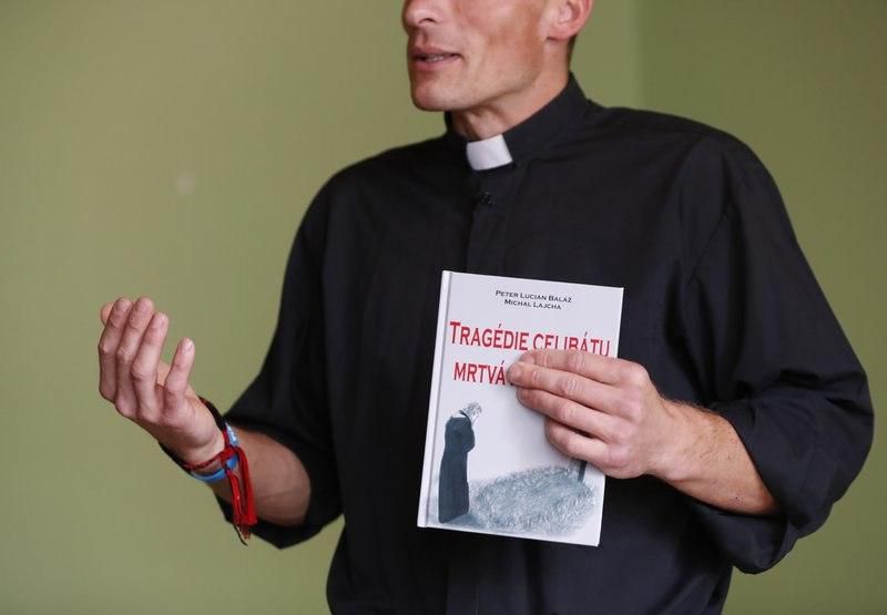 Rev. Michal Lajcha with his book